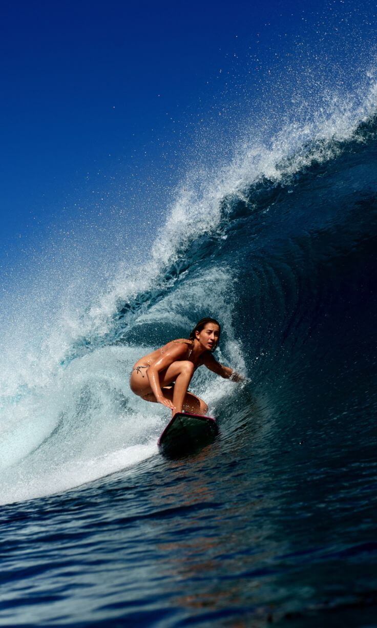 A surfing woman.
